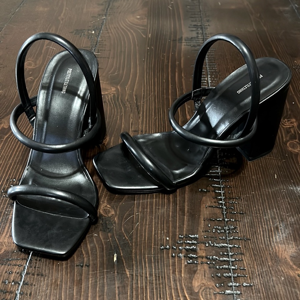 Strappy black heels